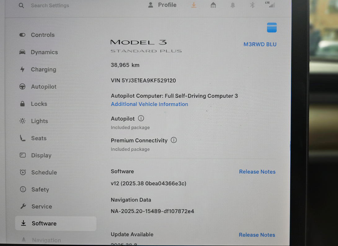 Car dashboard screen displaying Model 3 vehicle information and software details.